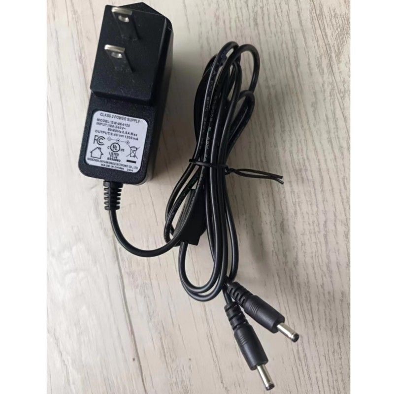 شارژر استاندارد ایالات متحده 8.4V 1.2A با دو سر DC برای باتری دستکش گرم